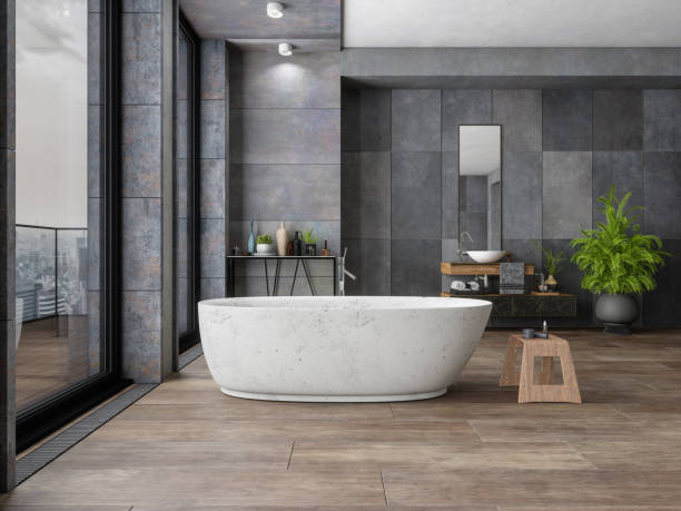 Bathroom tile dark flooring with bath tub | Thornton Flooring