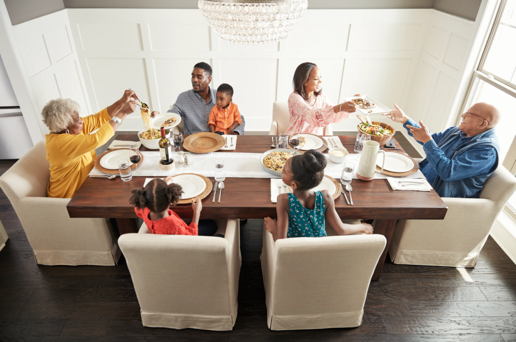 Family having breakfast at the dining table | Thornton Flooring
